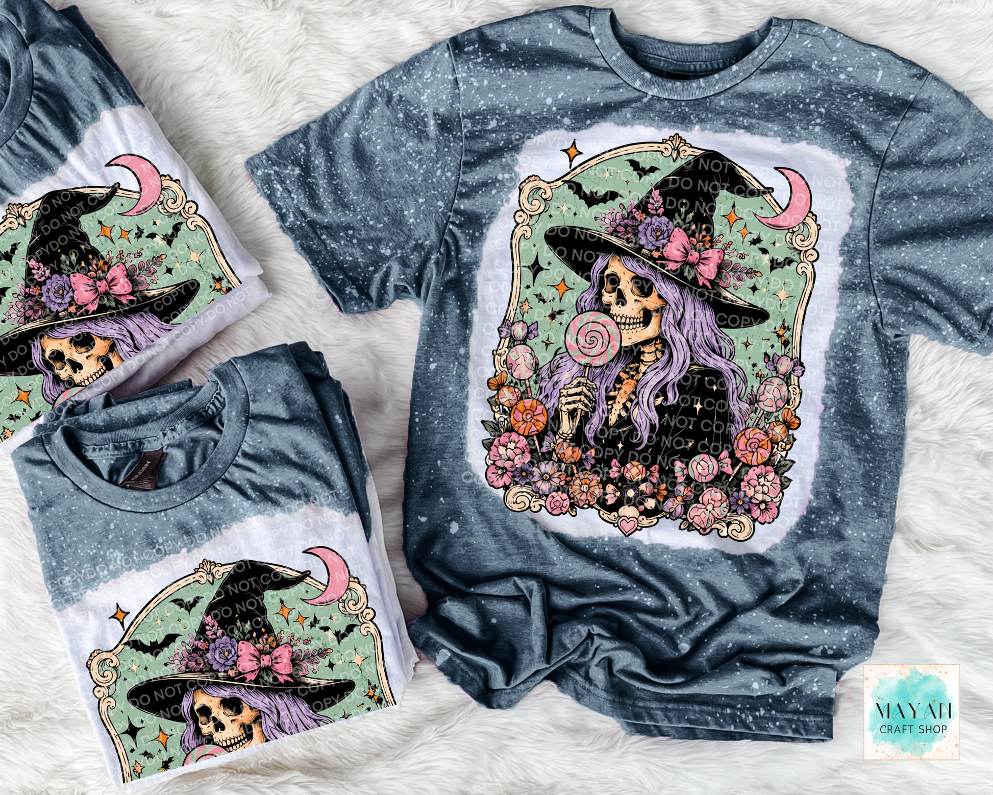 Gray t-shirt with a skeleton wearing a witch hat and surrounded by flowers on a textured surface.