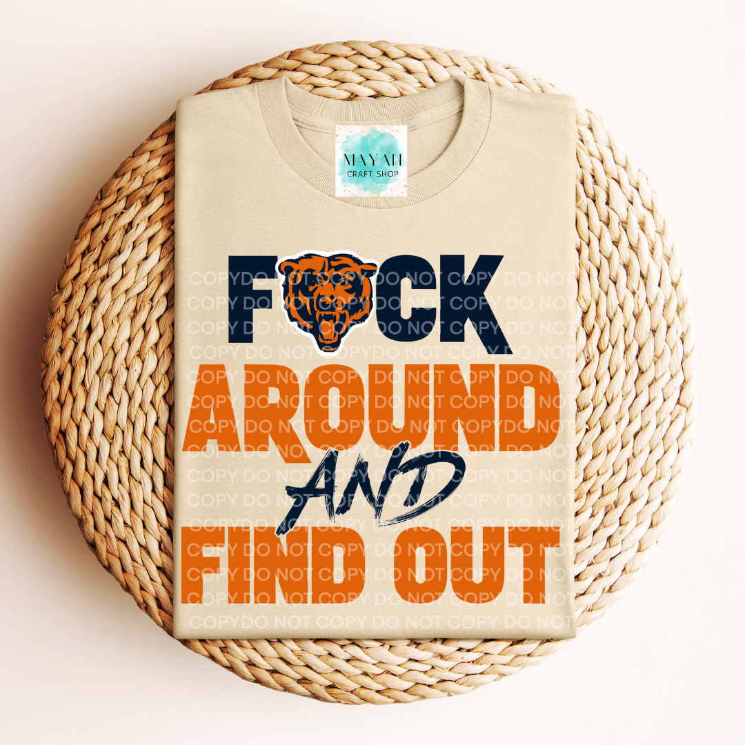 Sand t-shirt with graphic design on a woven surface