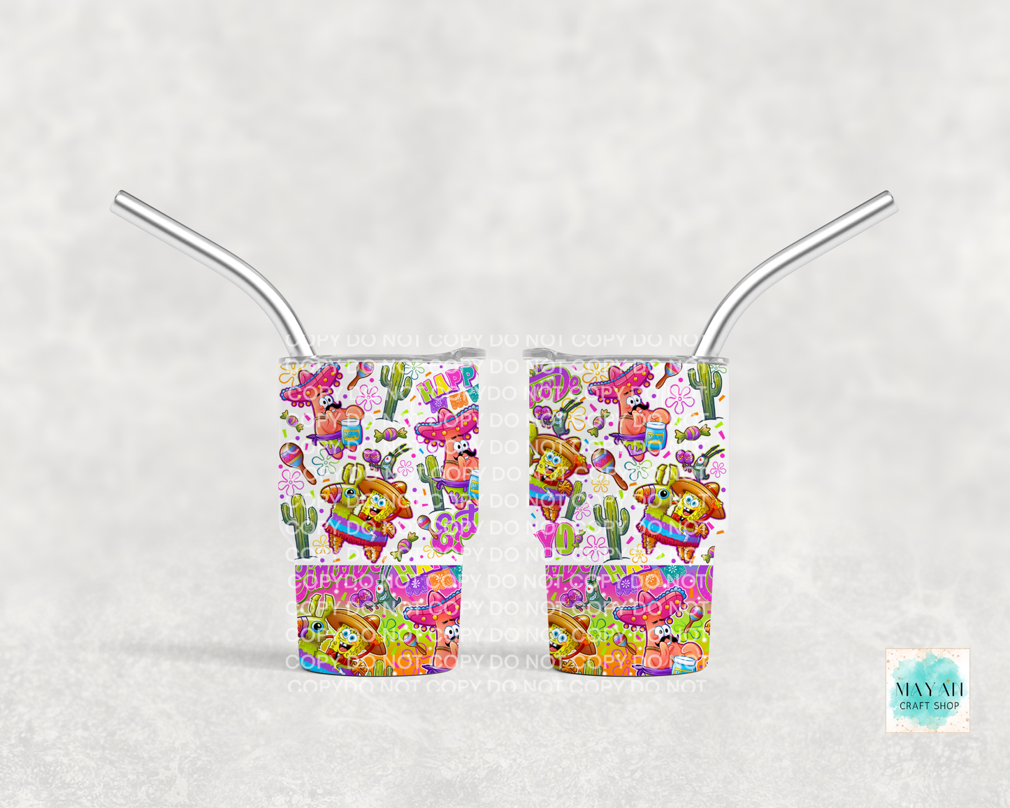 Two colorful tumblers with straws on a white background