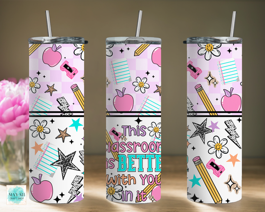 Three tumblers with a colorful design featuring apples, pencils, and stars on a white background.