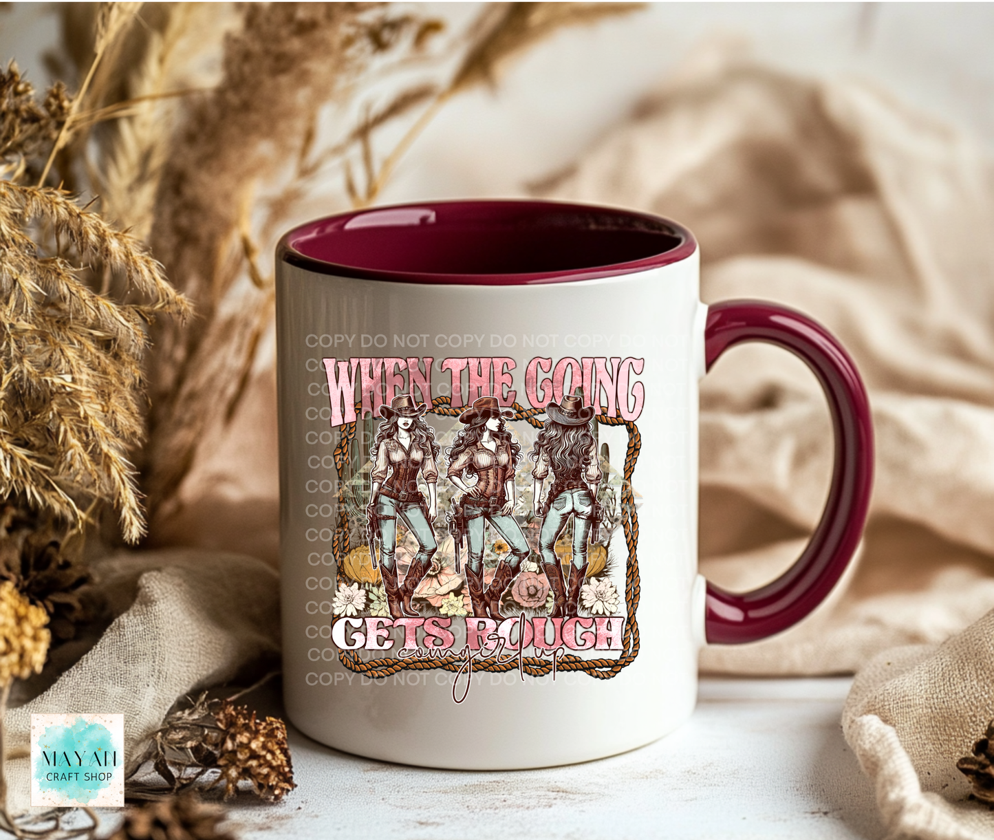 Mug with graphic design and text 'When the Going Gets Rough' on a neutral background