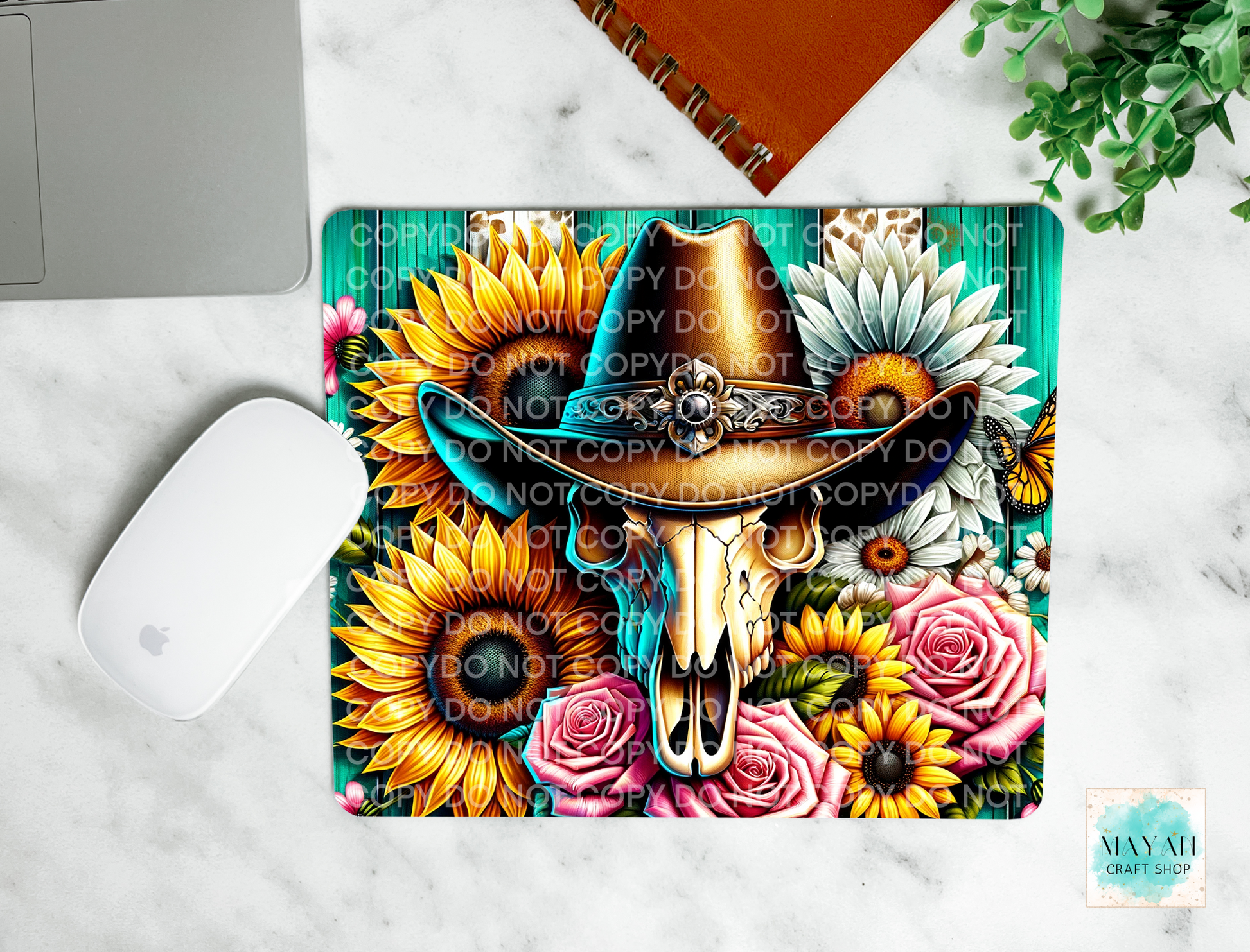 Cow skull mouse pad. -Mayan Craft Shop