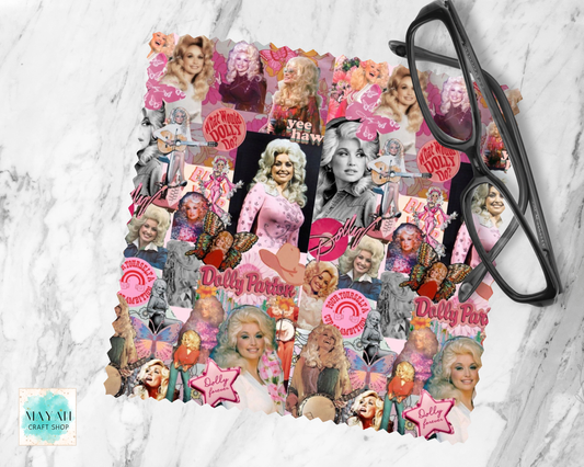 A lens cloth cleaner of pink and black-and-white photos featuring a country singer, with butterflies, stars, and retro graphics, styled on a white marble surface next to black eyeglasses.