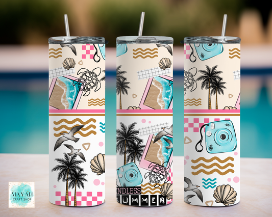 Three tumblers with summer-themed designs featuring palm trees, seashells, and cameras on a blurred background.