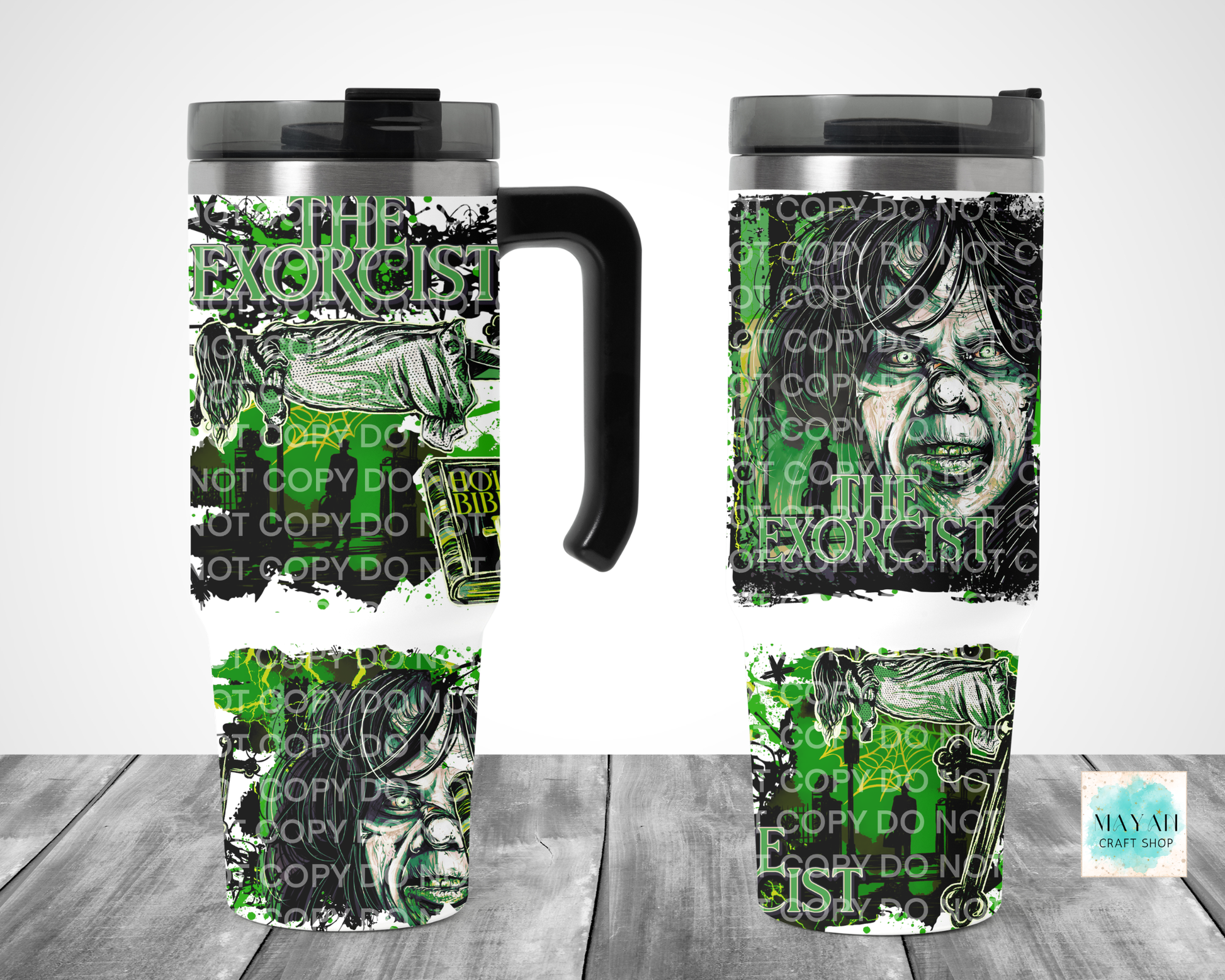 A travel mug shown from multiple angles on a gray wood plank background. The mug has a black handle and lid, with a wraparound graphic design in black, white, and bright green.