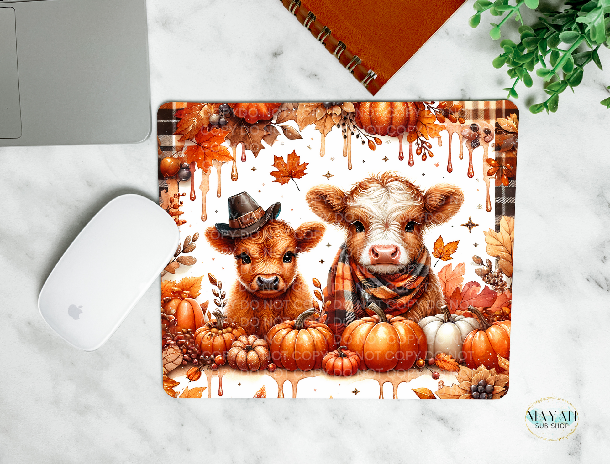 Fall cows mouse pad. -Mayan Sub Shop