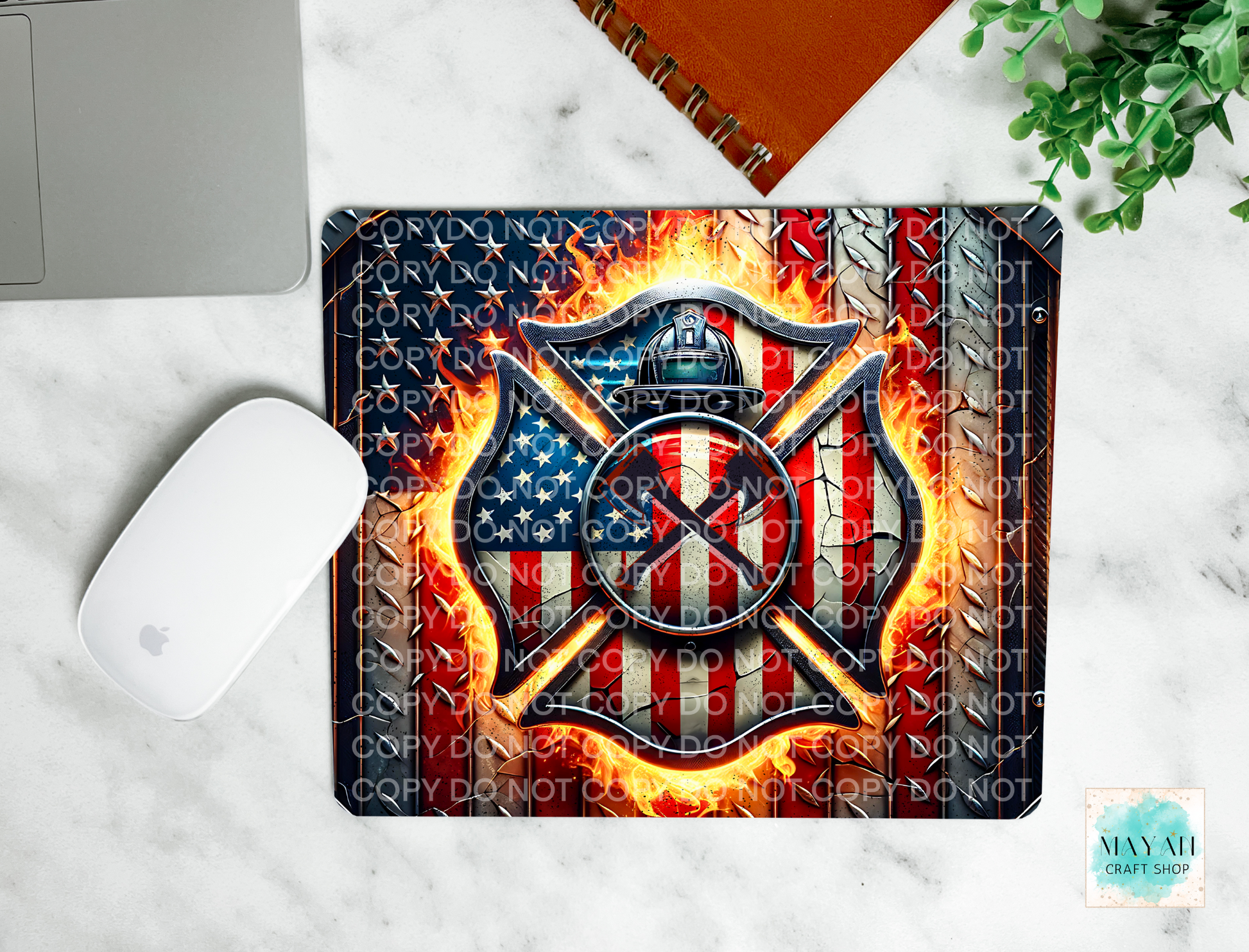 Firefighter-themed mouse pad with American flag design on a marble surface.