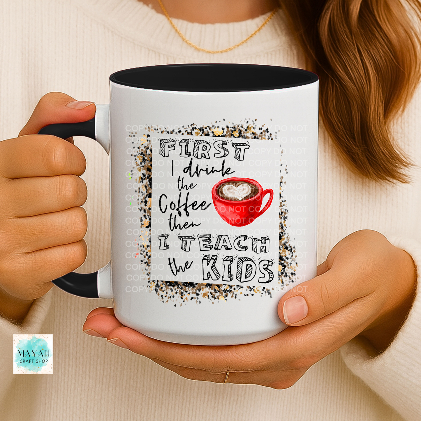 Person holding a mug with a coffee-themed quote