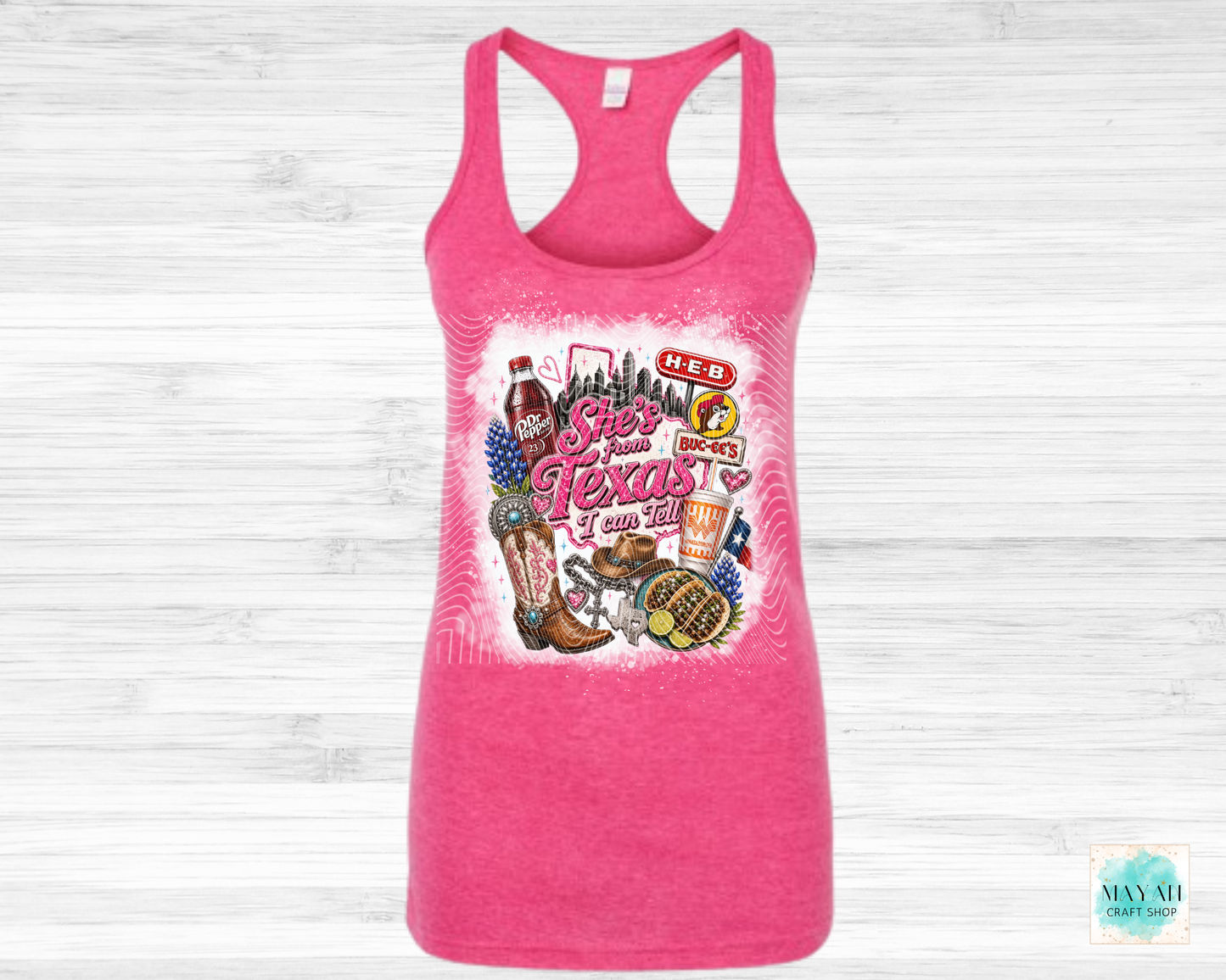 Pink tank top with Texas-themed graphic on a white background