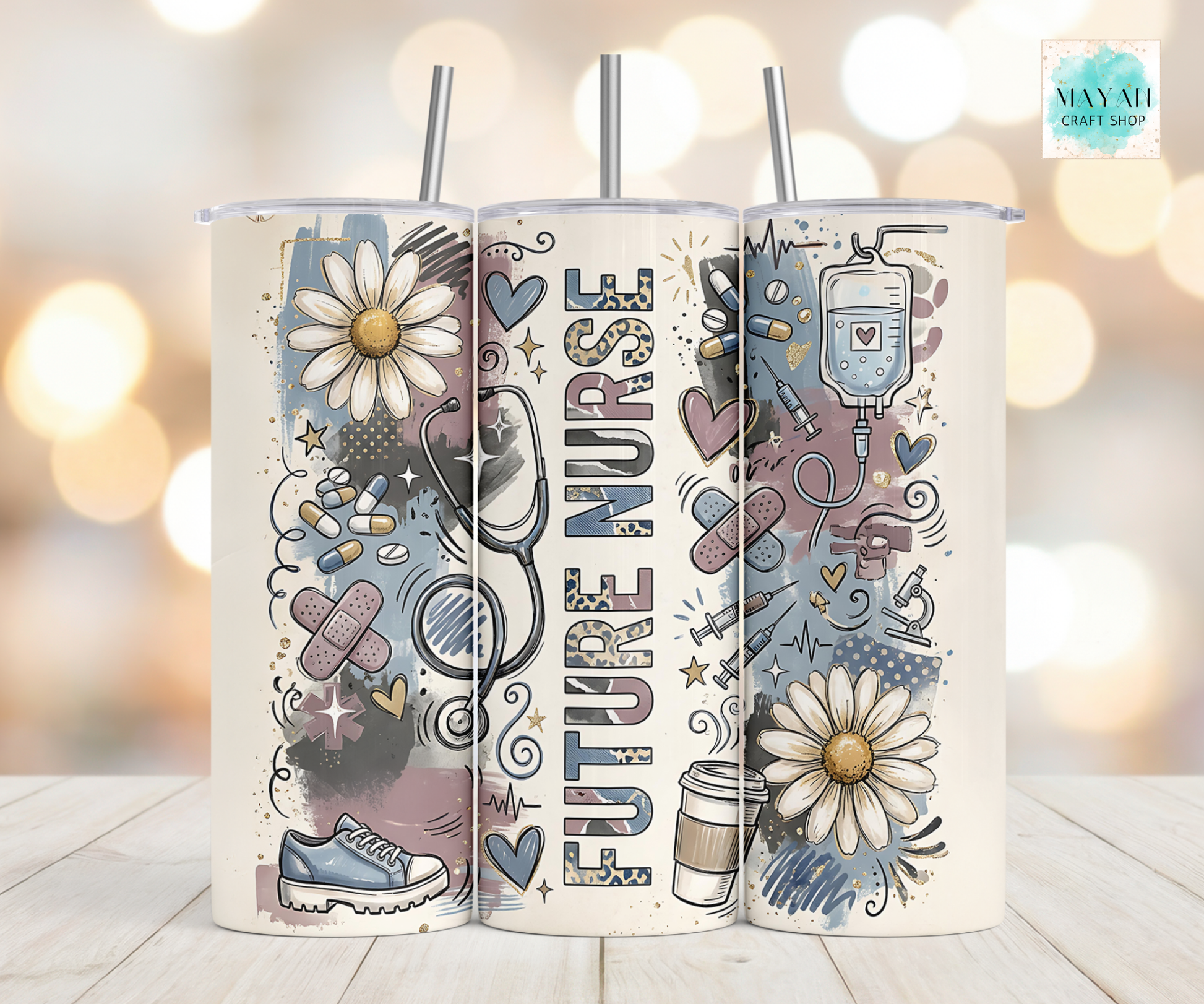 Three tumblers with nurse-themed designs on a wooden surface with a blurred background.