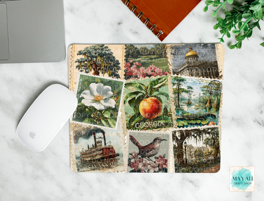 Decorative mouse pad with vintage-style images on a marble surface.