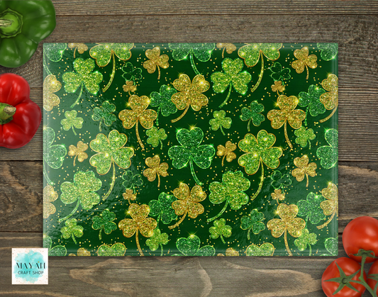Decorative cutting board with shamrock pattern on a wooden surface