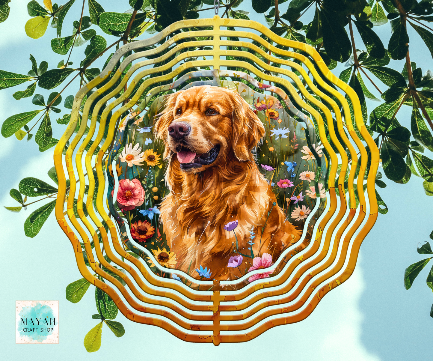 A decorative wind spinner, featuring a golden retriever dog surrounded by colorful wildflowers, set against a background of green leaves and a light blue sky. It has a scalloped wavy edge and is displayed as a mockup.