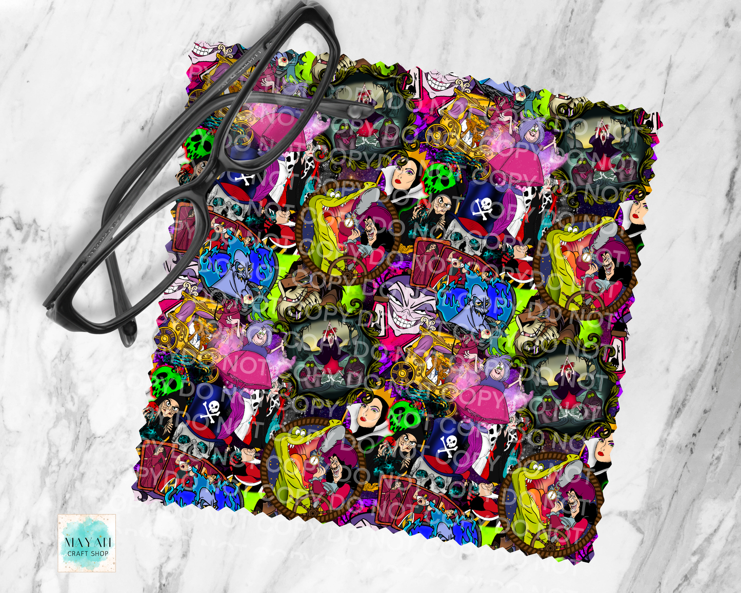 Colorful lens cloth cleaner with animated character designs on a marble background