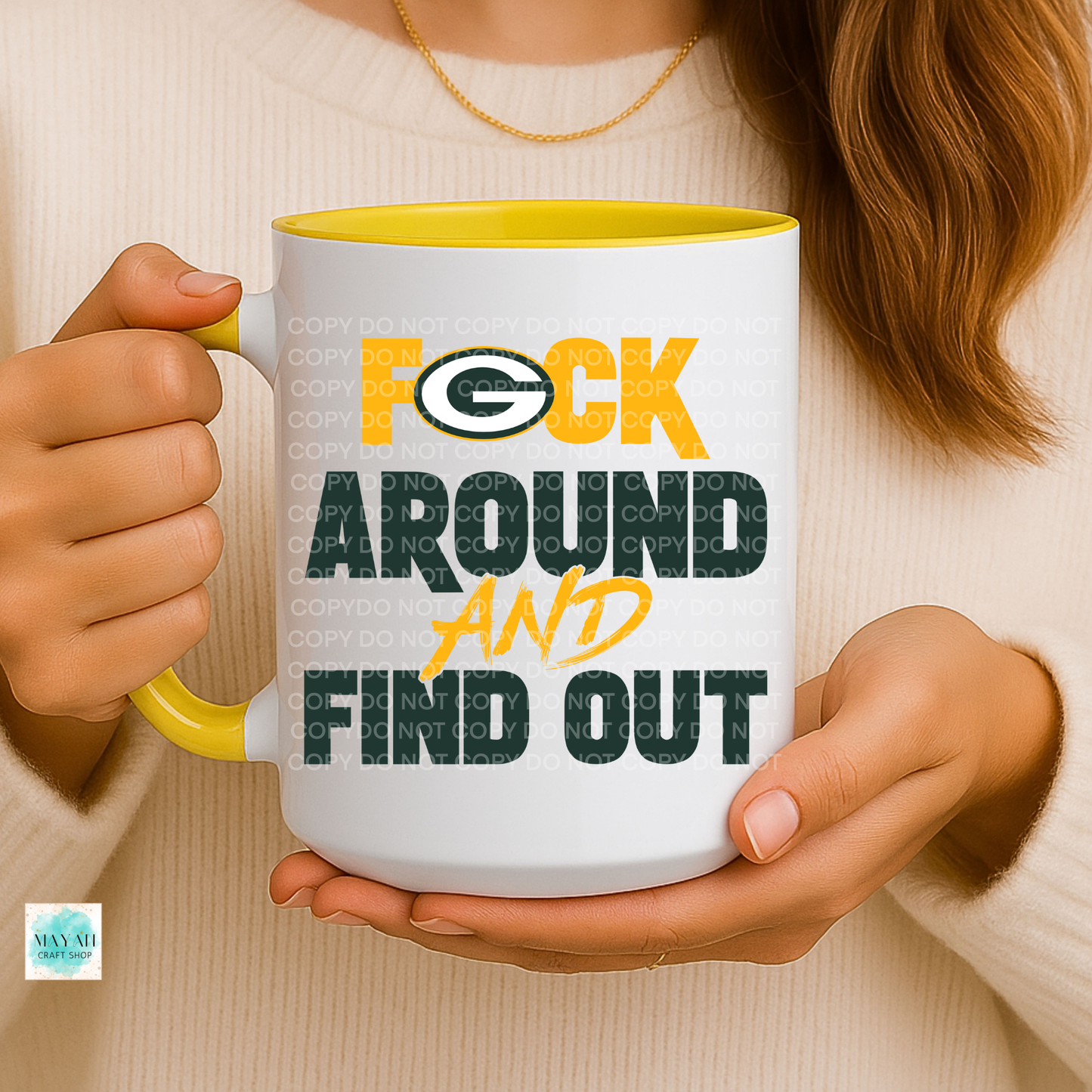 Person holding a mug with text and logo