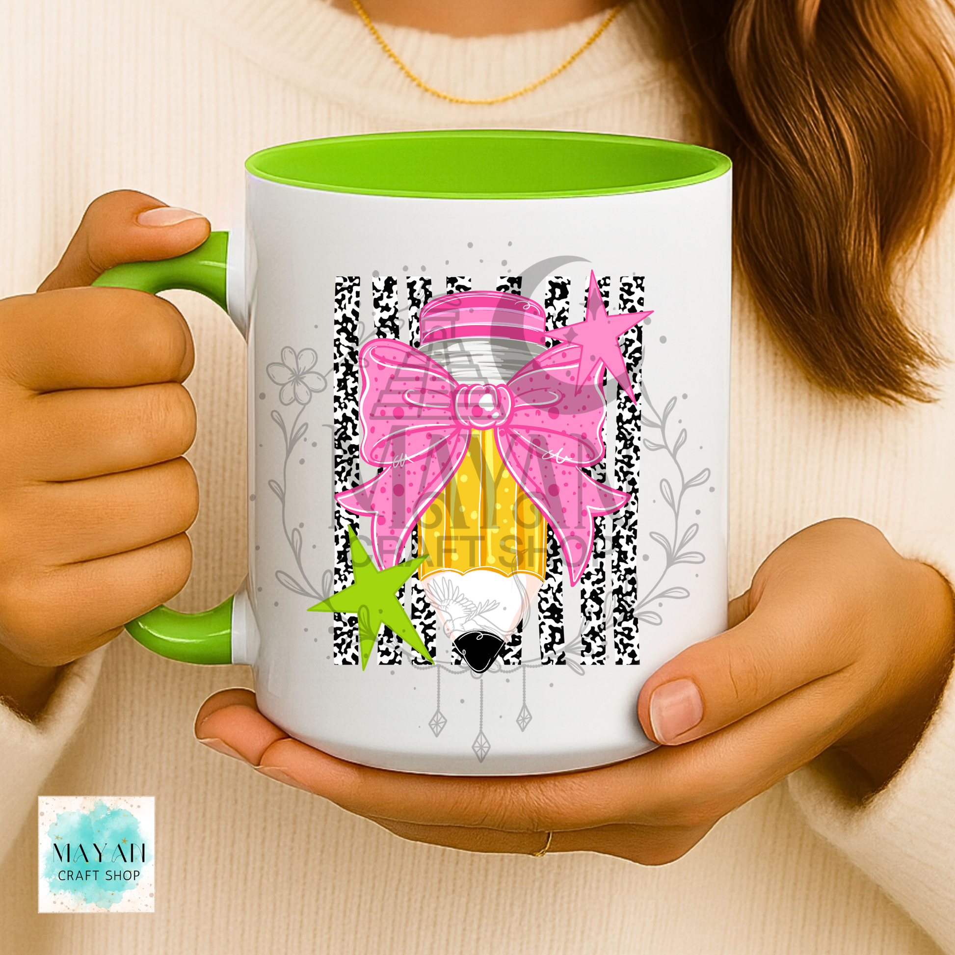 Pencil bow light green mug.