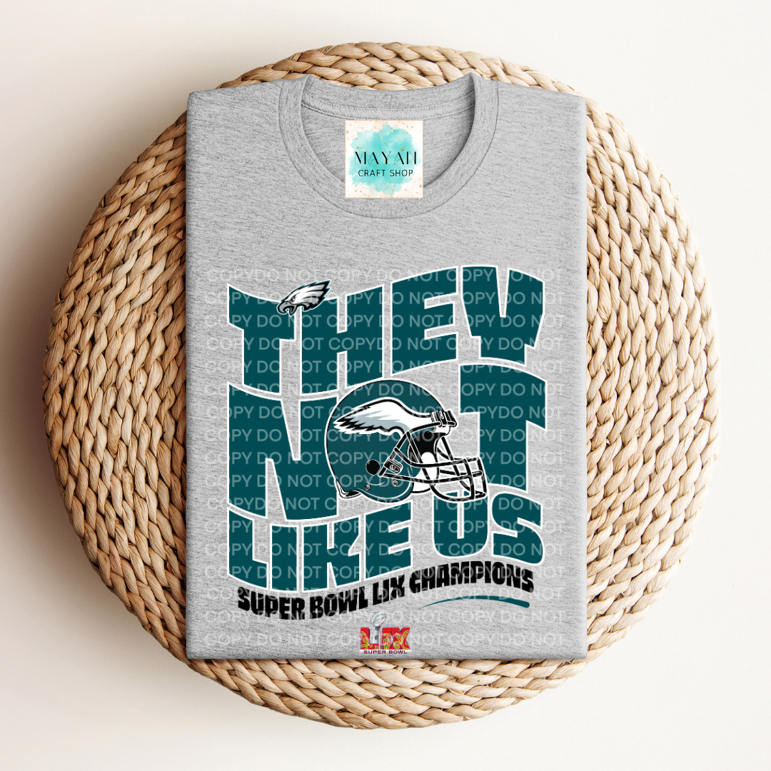 SB 2025 champs not like us heather grey shirt. -Mayan Craft Shop