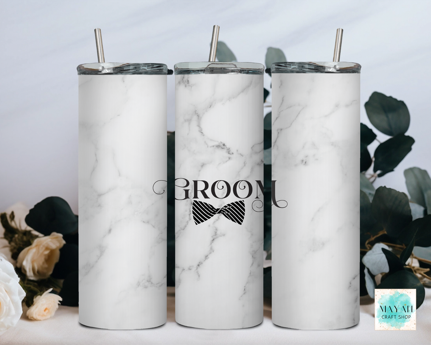 Three marble-patterned tumblers with 'GROOM' and bow tie design, surrounded by decorative elements.