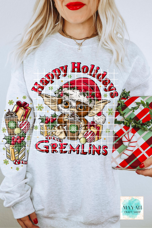 White sweatshirt with 'Happy Holidays' design featuring a cartoon character and festive elements.