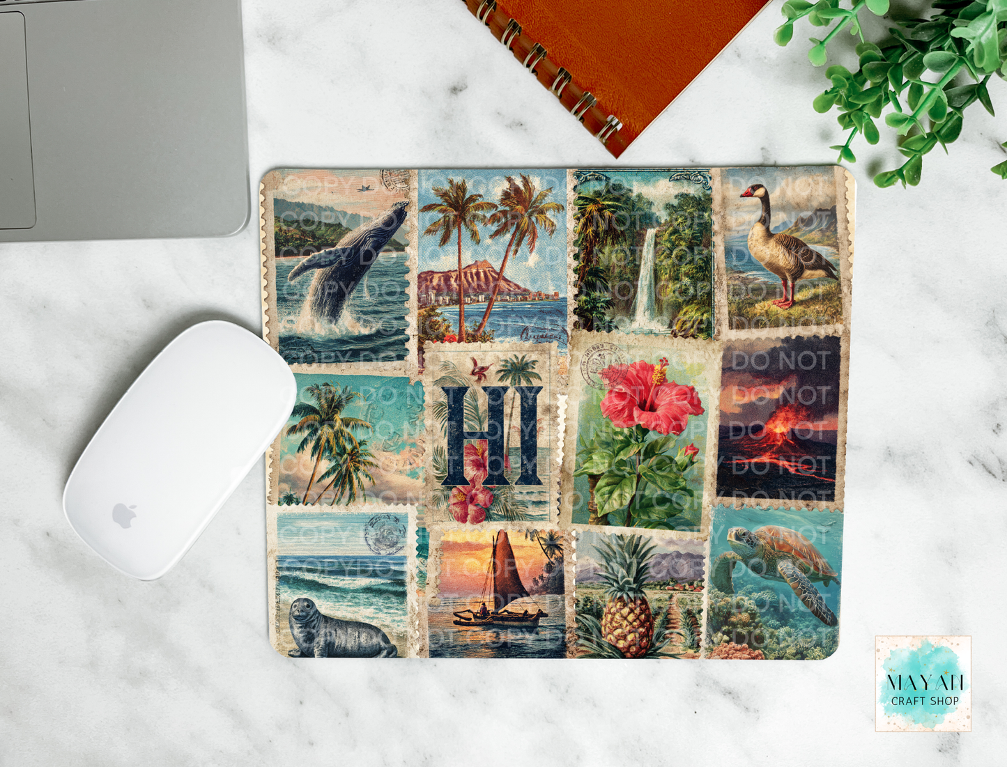 Mouse pad with vintage-style collage design on a marble surface