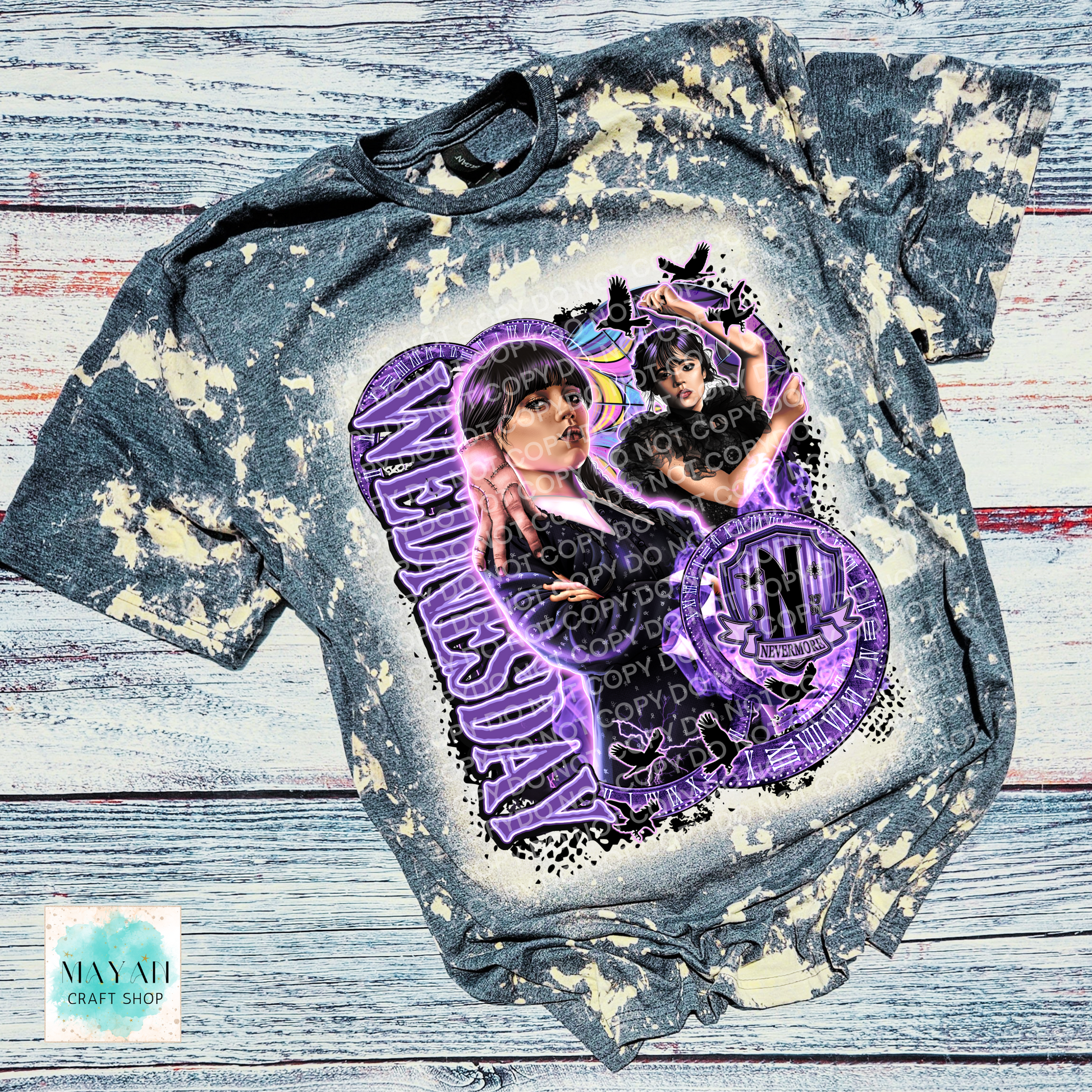 Bleached t-shirt with graphic design on a wooden surface