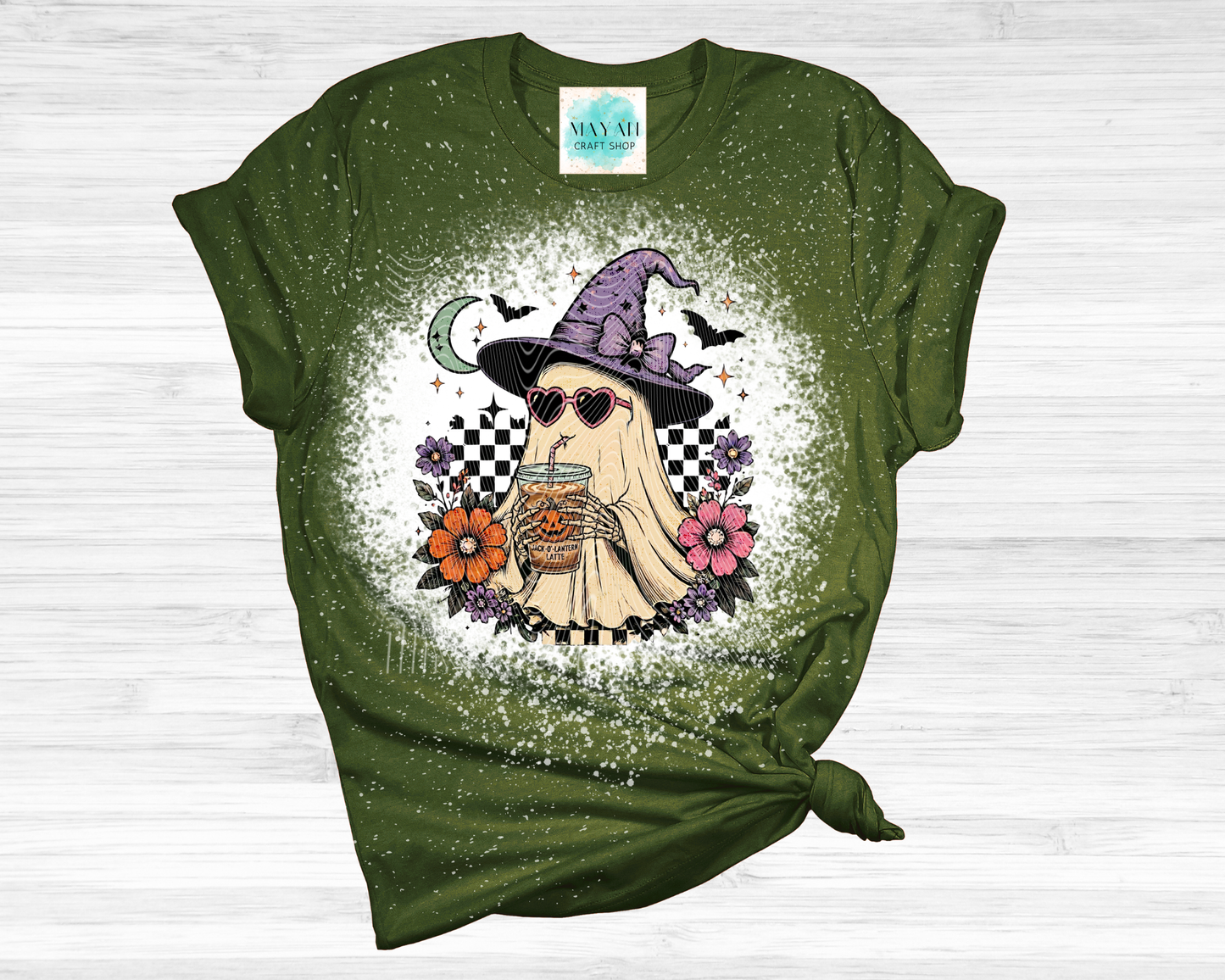 Green t-shirt with a ghost in a witch hat and sunglasses design on a white background