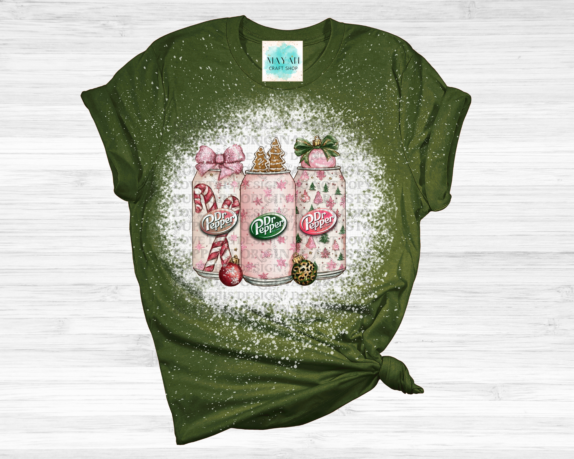 Green t-shirt with a festive design featuring soft drinks and ornaments on a white background