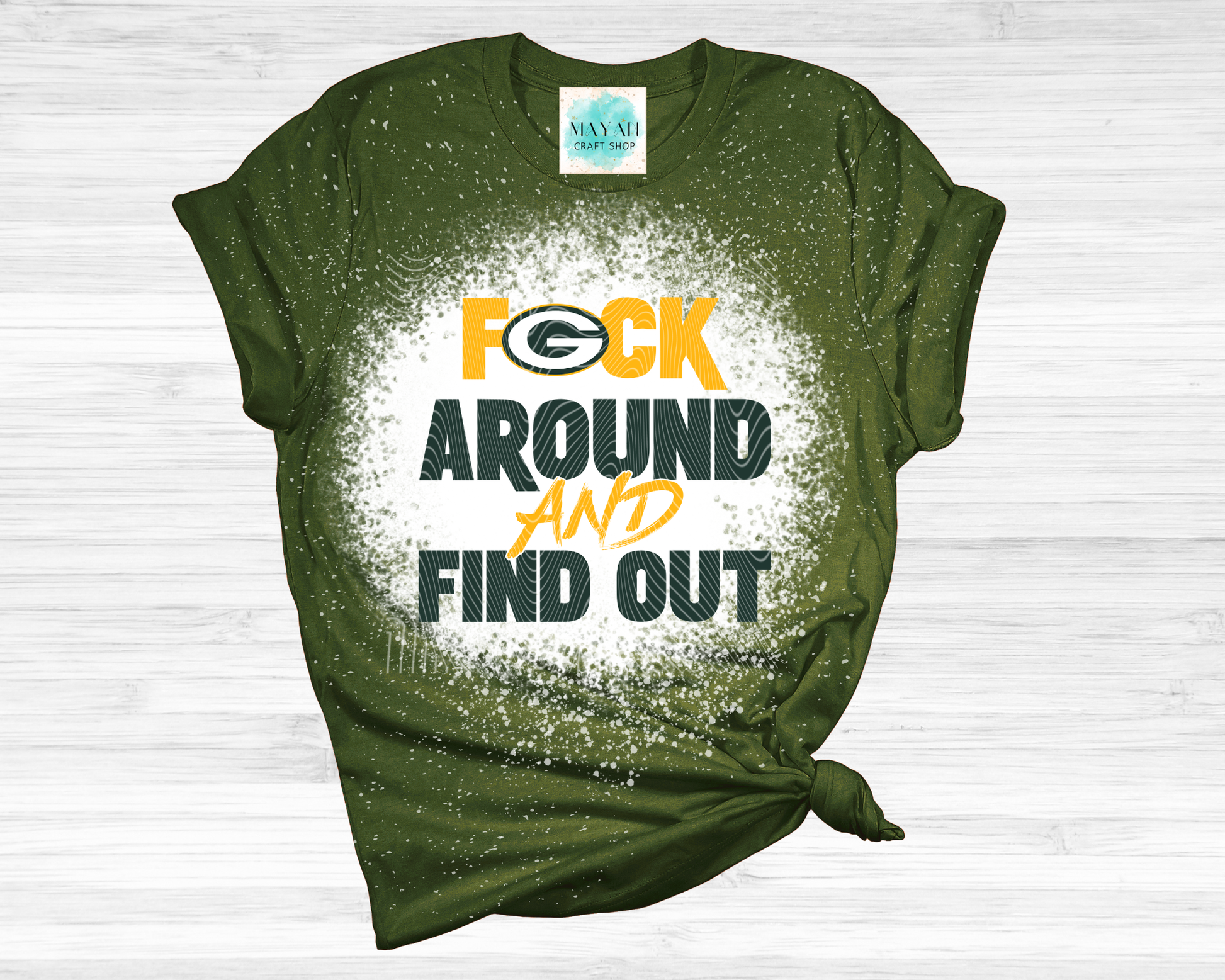 Green t-shirt with graphic text and logo on a white background