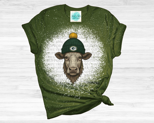 Green t-shirt with a cow wearing a green hat graphic on a white background