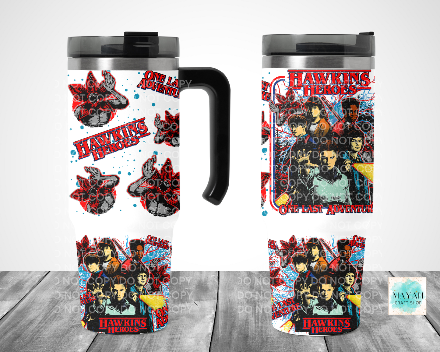 Two travel mugs with 'Heroes' design featuring characters and text.