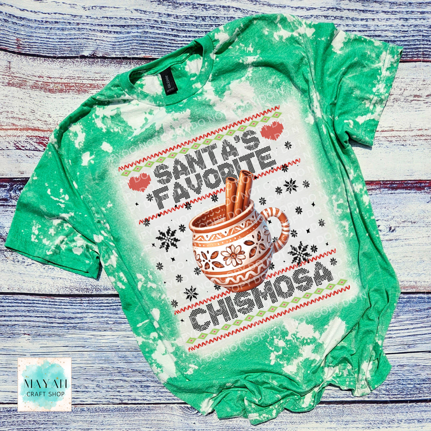 Santa's favorite chismosa heather irish green bleached tee. -Mayan Craft Shop