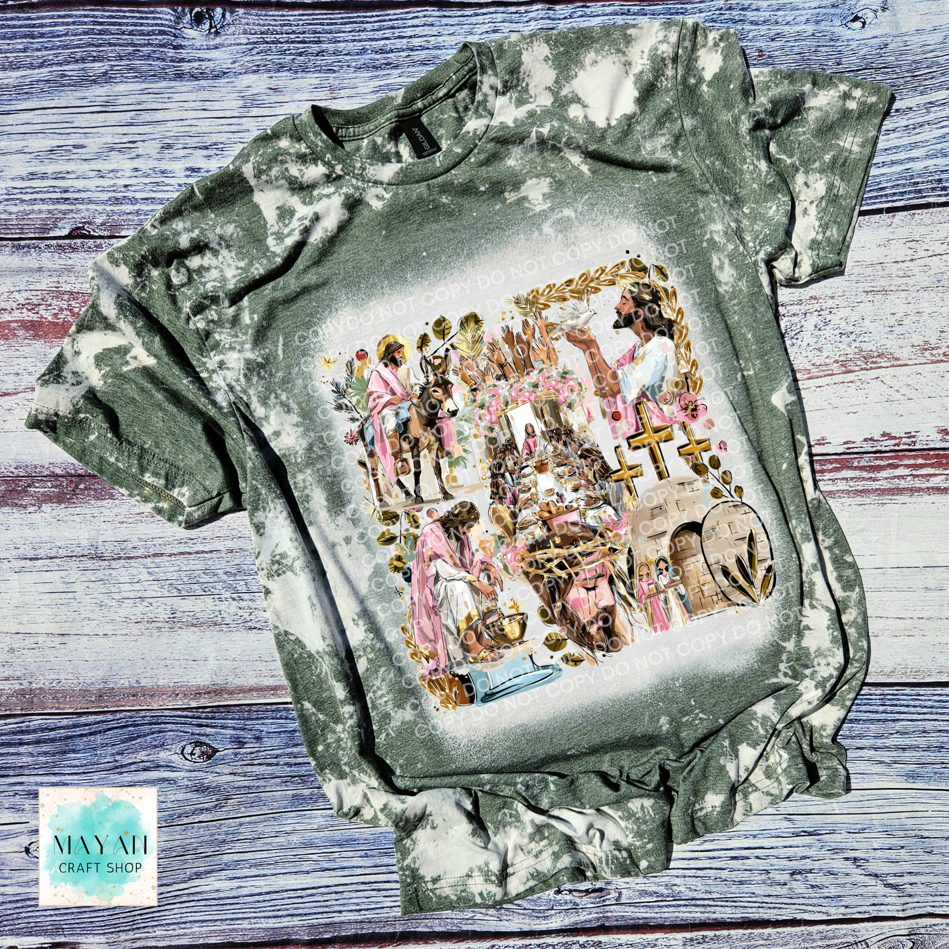 T-shirt with a colorful graphic design on a wooden surface.