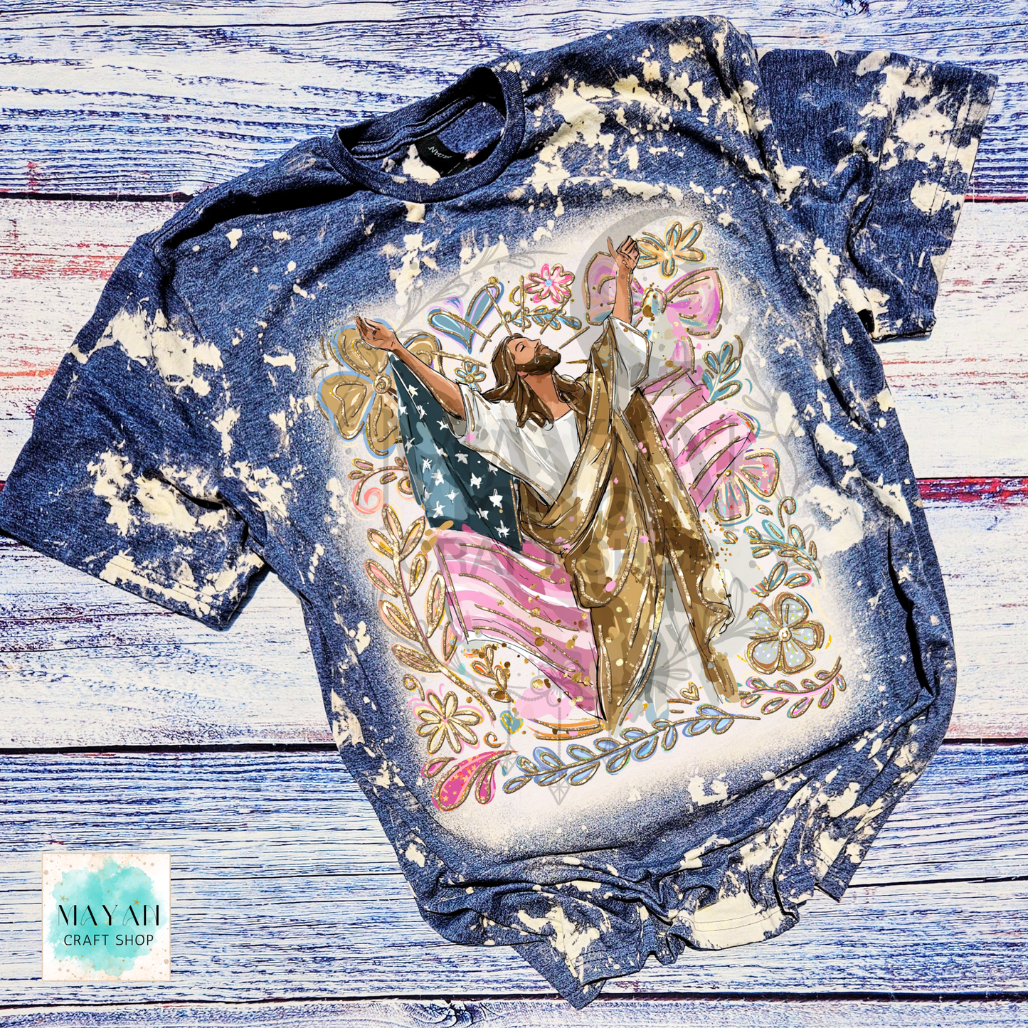 Bleached t-shirt with a graphic design of a person holding an American flag on a wooden surface.