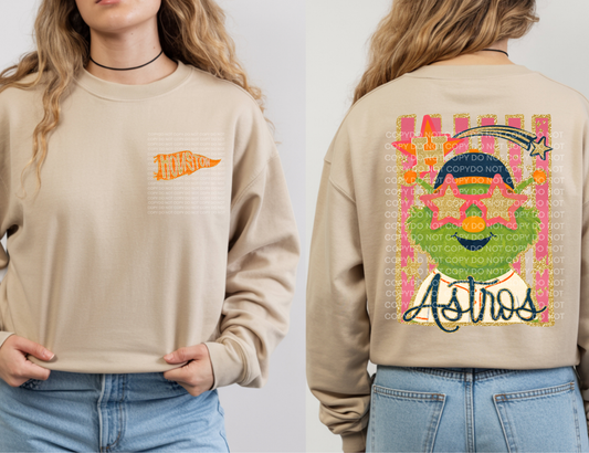Beige sweatshirt with baseball graphics on front and back, worn by a person.