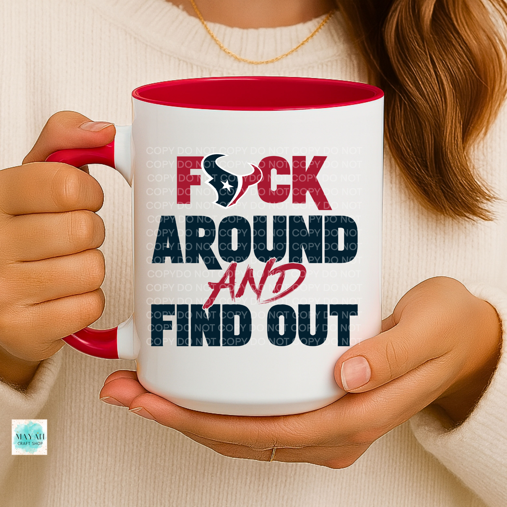 Person holding a mug with text 'F*CK AROUND AND FIND OUT' in red and blue.
