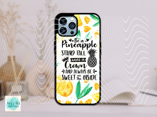 Phone case with pineapple design and text on a white background