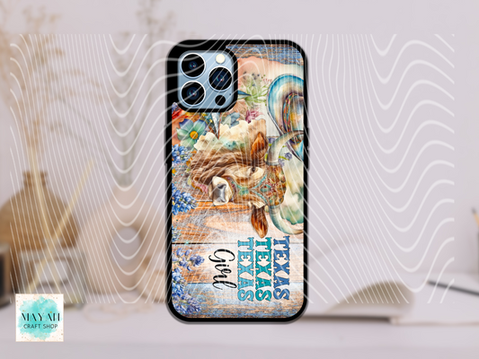 Phone case with ocean-themed design and 'Texas Girl' text on a white surface
