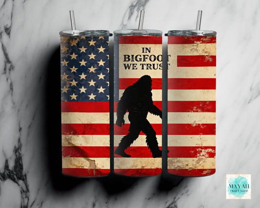 Three tumblers with American flag and Bigfoot design on a marble background