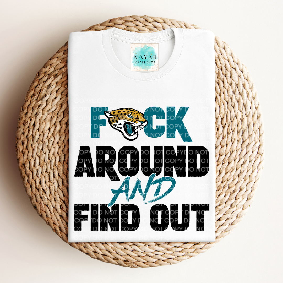 White t-shirt with graphic design and text on a woven surface