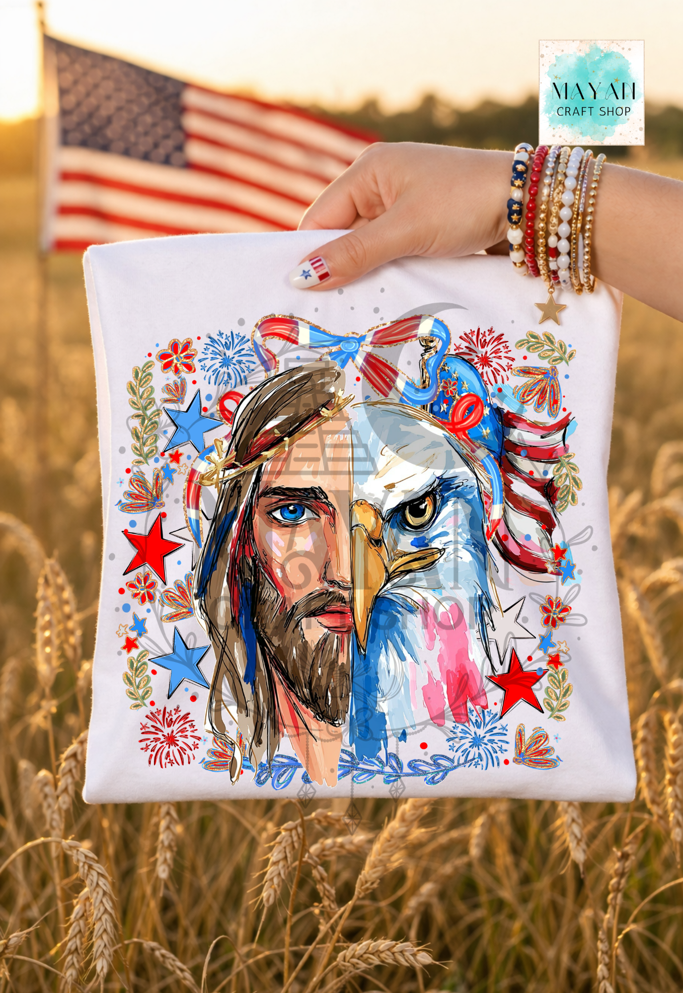 Hand holding a white pillow with an American-themed design featuring an eagle and a face, with an American flag in the background.