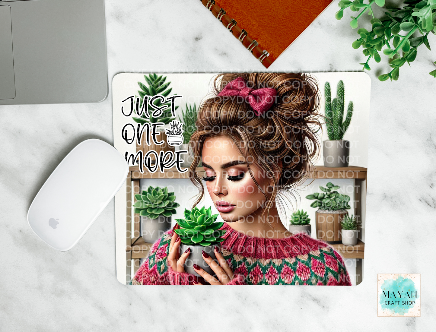 Just one more mouse pad. -Mayan Craft Shop