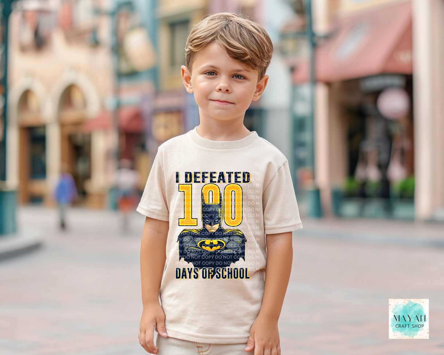 Defeated 100 days kids heather dust shirt. -Mayan Craft Shop