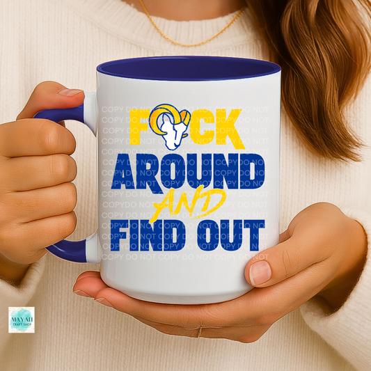 Person holding a mug with a humorous design and text.
