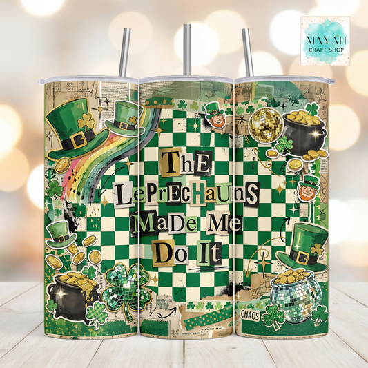 Three green tumblers with St. Patrick's Day designs and text on a blurred background.
