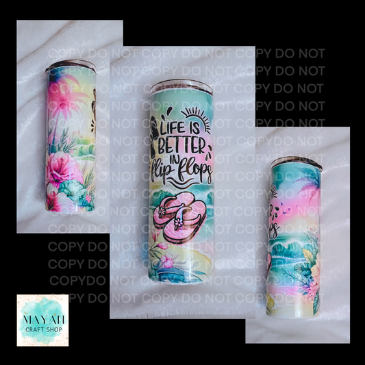 Colorful tumblers with floral and flip-flop designs on a white background.