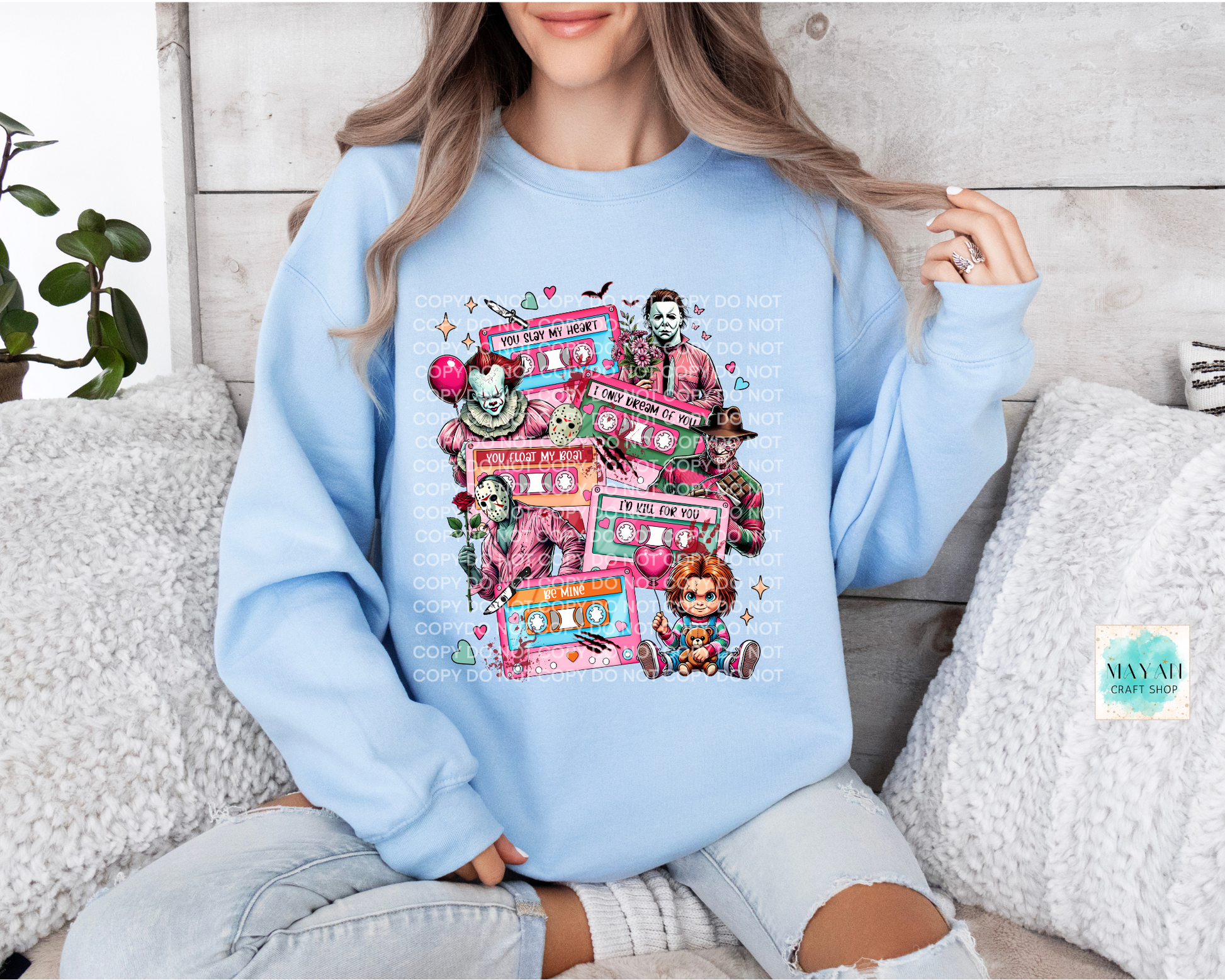 Love mixtape horror light blue sweatshirt. -Mayan Craft Shop