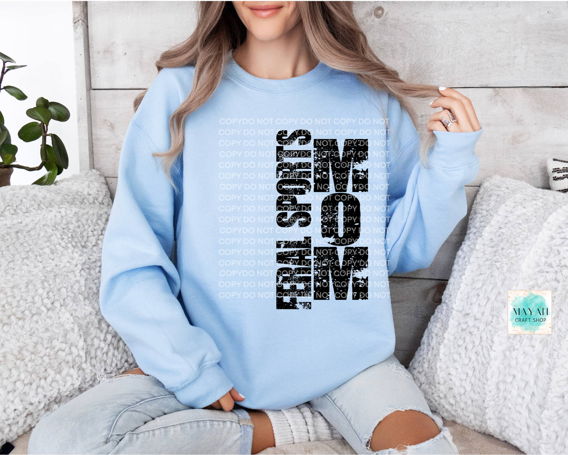 Feral sports mom light blue sweatshirt. -Mayan Craft Shop