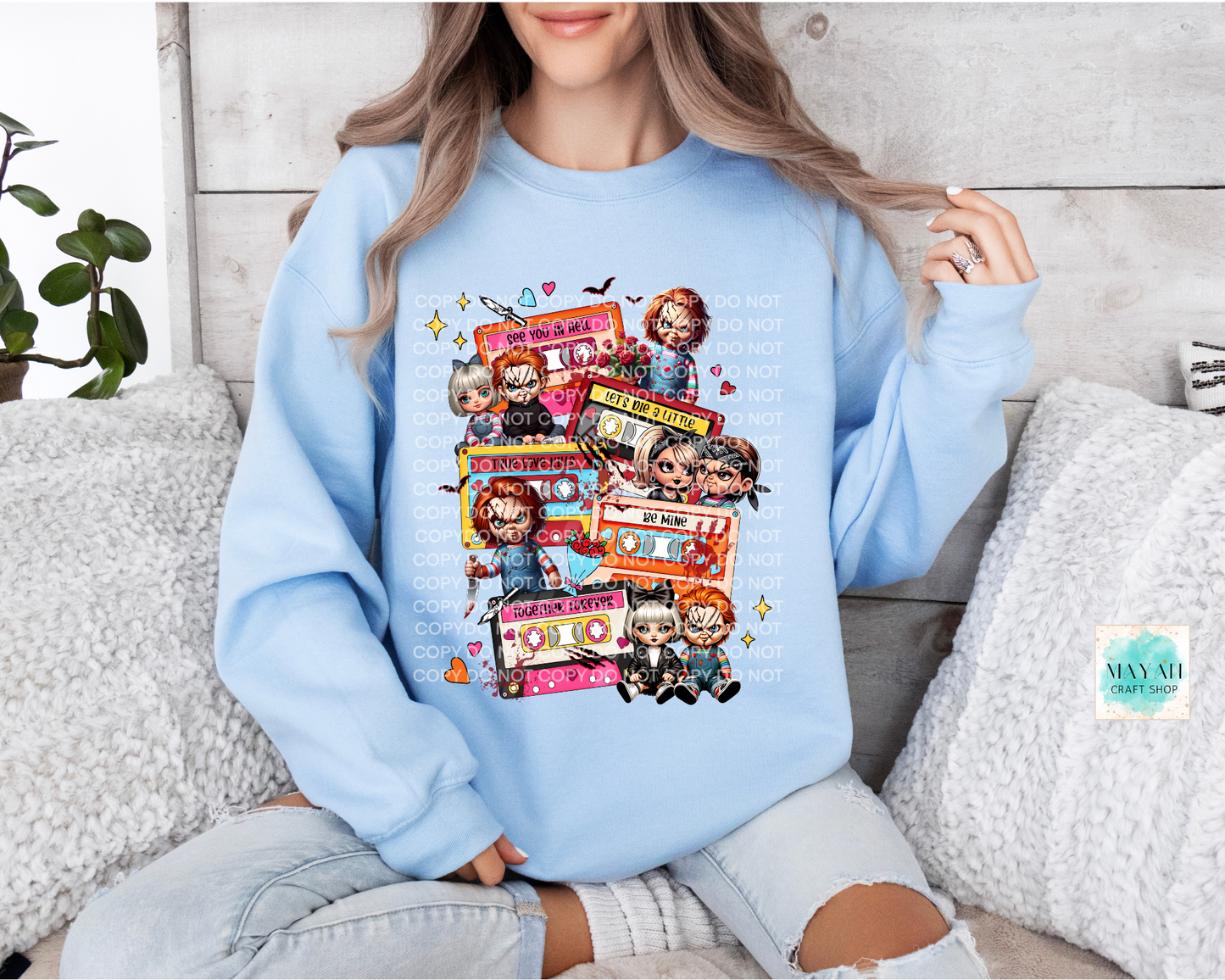 Love mixtape deadly dolls light blue sweatshirt. -Mayan Craft Shop