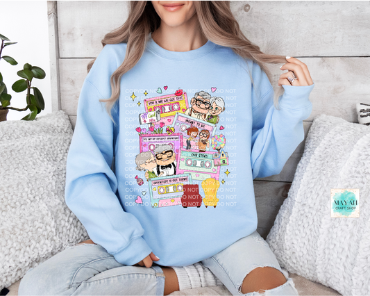 Love mixtape couple light blue sweatshirt. -Mayan Craft Shop