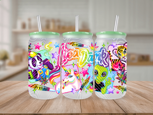 Three colorful tumblers with cartoon characters on a wooden table.